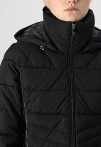 ONLY ONLHELEN PUFFER COAT - Abrigo de invierno - black