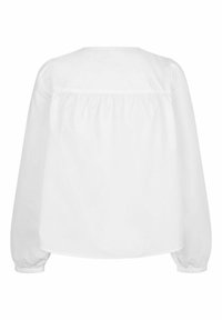 White long-sleeve blouse with a round neckline, gathered back detail, and elasticized cuffs, made from smooth cotton fabric.