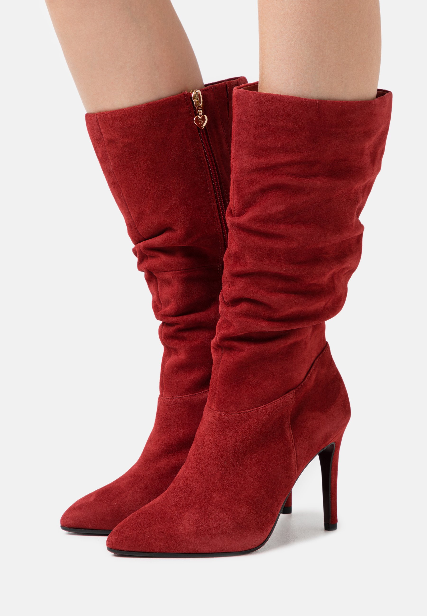 red heeled boots uk