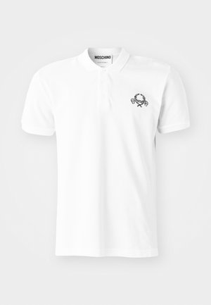 Polo-shirt blanc en coton avec un design brodé noir sur la poitrine gauche. Col classique et patte de boutonnage.
