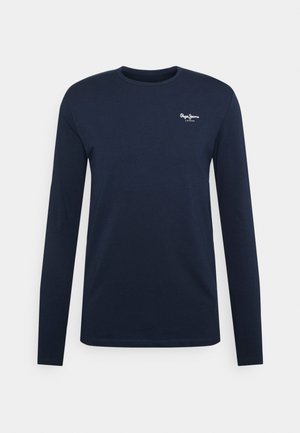 Marineblå langermet t-skjorte laget av bomull. Har rund hals og en liten hvit logo på venstre bryst. Glatt tekstur, vanlig passform.