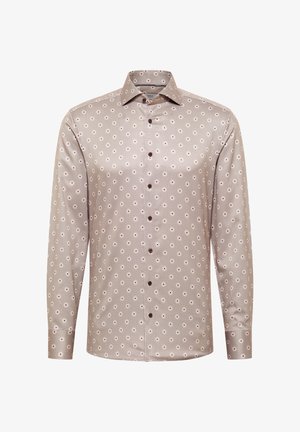 Chemise à manches longues de couleur marron clair avec un motif géométrique de petits cercles, fermeture boutonnée sur le devant, col classique et texture lisse.