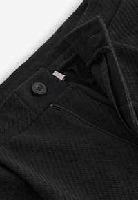 Next TEXTURED REGULAR FIT - Pantaloni - black