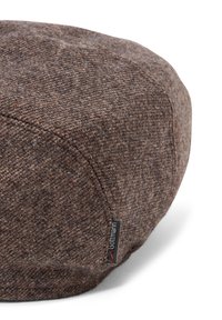 Brown tweed flat cap with visible stitching and a small black label reading "Göttmann" on a white background.