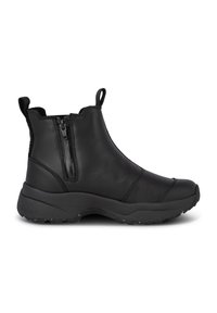 Bottine à la cheville en cuir noir avec fermeture éclair latérale, tirettes à l'avant et à l'arrière, et semelle épaisse en caoutchouc à relief pour l'adhérence.