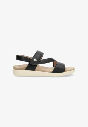Sandalias negras con tiras de cuero texturizado, diseño de tiras cruzadas, respaldo ajustable y una suela acolchada de color claro.