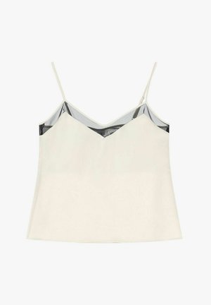 Top in raso bianco con spalline sottili e un inserto in rete nera trasparente lungo la scollatura.