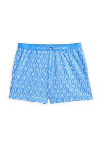 Modré bavlnené boxerky s bielym paisley vzorom a svetlomodrým pásom s logom "TOMMY HILFIGER" vytlačeným v červenej a bielej farbe.