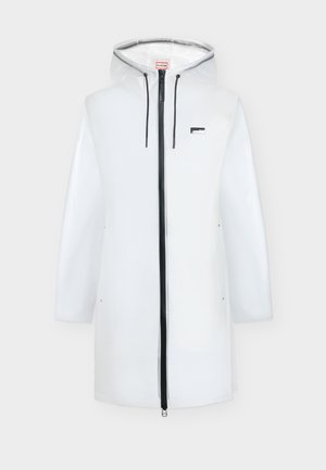 White long raincoat with hood, black front zipper, black drawstrings, and small logo patch on chest.