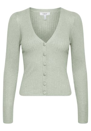 Viheribattu neulejakku V-pääntie, pitkät hihat ja kuusi nappia edessä, valmistettu pehmeästä kankaasta, jossa on tekstuuripinta.