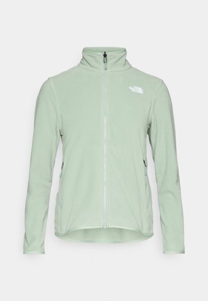 Licht mintgroene fleecejack, met volledige rits, hoge kraag, voorzien van twee zijzakken en een klein wit logo op de linkerbovenkant van de voorkant.