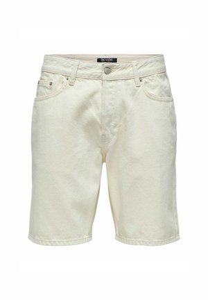 Beežid teksapüksid klassikalise viie tasku disainiga, nööpidega sulgemine ja diskreetne õmblusdetail, millel on mugav lõige ja sile tekstuur.