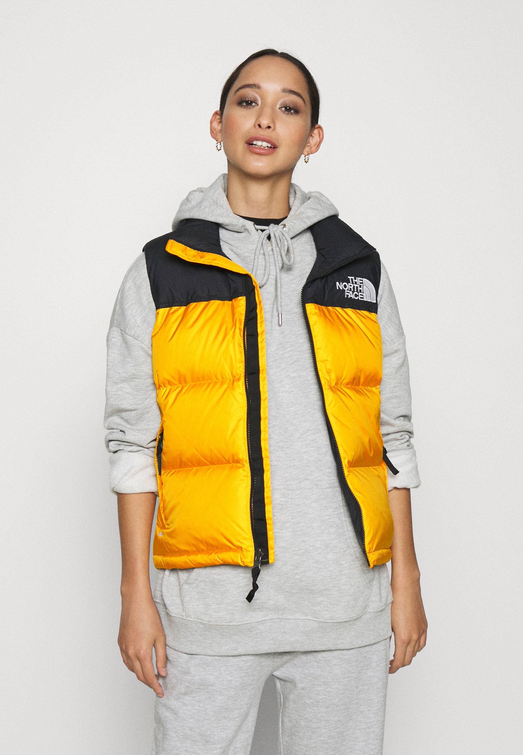 north face gold vest