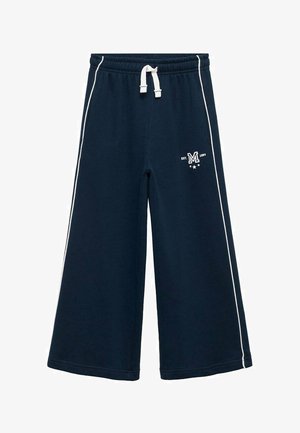 Mørkeblå brede sweatpants med hvide sidestriber og snøre i taljen. Har et lille logo med "EST. 1984" og stjerner design.