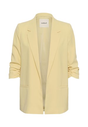 Blazer femme jaune clair avec manches trois-quarts froncées, revers crantés et poches passepoilées devant, étiquette « soaked » à l’intérieur du col.