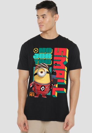 Black cotton t-shirt featuring a cartoon Minion in red overalls, with "NO JOB TOO SMALL" text in colorful font on the front.