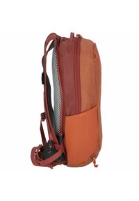 Red and orange backpack with mesh and textured fabric on the side. Features adjustable straps and external pocket for added storage.