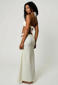 Moda Minx Ranta-asusteet - coconut