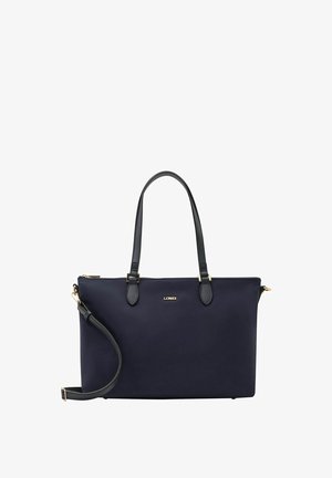 Navy blauwe tote bag van soepel materiaal, met dubbele handvatten, een afneembare schouderband, goudkleurige hardware en een ritssluiting.