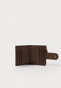 Brown leather wallet with multiple card slots and a zippered coin pocket. Features a snap closure and a smooth, textured finish.