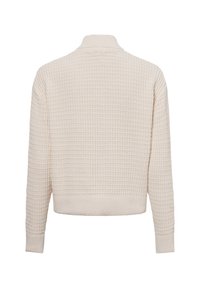 Crème trui met een gestructureerd, wafelbreipatroon, ribboorden bij de mouwen en zoom. Heeft een hoge kraag en een relaxte, cropped fit.