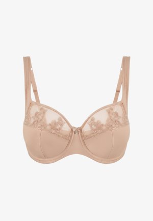 Nude-colored underwire bra with adjustable straps and floral lace detailing on upper cups, featuring a small central decorative charm.