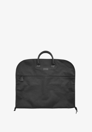 Mustast kangast riidekott kahekordsete käepidemete ja horisontaalse lukuaugu taskuga ees.