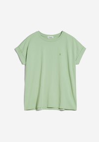 T-shirt en coton vert clair à manches courtes avec un col rond et un petit logo brodé sur le côté gauche de la poitrine.