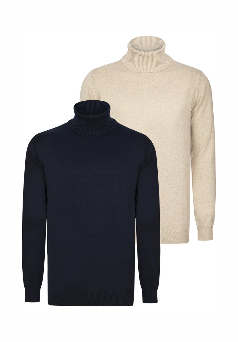 Twee coltruien: één in marineblauw en één in crème. Beide zijn gebreid, met ribbels bij de kraag en manchetten en hebben een gladde textuur.