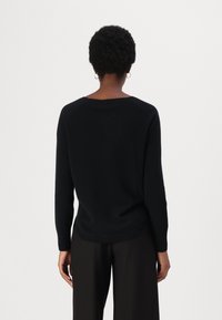 Repeat - Sweter