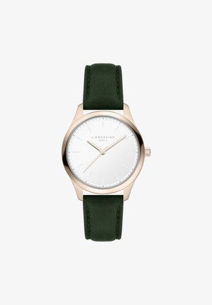 Runde Uhr mit weißem Ziffernblatt, Gehäuse aus Roségold und grünem Wildlederarmband. Verfügt über schlichte Stundenmarkierungen und zarte Zeiger.