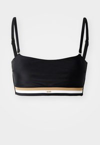 Bralette nera con spalline sottili regolabili, caratterizzata da una striscia orizzontale oro e bianca nella parte inferiore e un piccolo logo dorato.