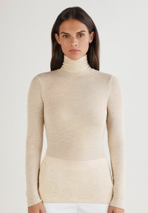 Beige Rollkragenoberteil mit langen Ärmeln, glatter Textur, schlanker Schnitt, mit hohem Kragen und minimalistischem Design, ideal zum Lagenlook.