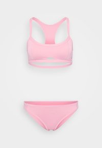 Růžový bikinový set obsahující braletku s racerback výstřihem a širokými ramínky a odpovídající nízké kalhotky. Hladká tkanina s minimalistickým designem.