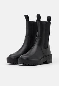 ONLY SHOES Botas con plataforma - black