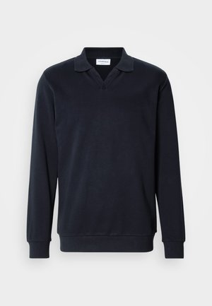 Mørkeblå langermet polo skjorte med v-hals, mykt bomullsmateriale, ribbet krage og mansjetter, og et rent minimalistisk design.