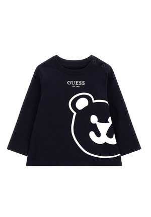 Marineblå langærmet toddlertrøje med hvidt GUESS-logo og stort hvidt omrids af et bjørnehoved på fronten, skulderknapper.