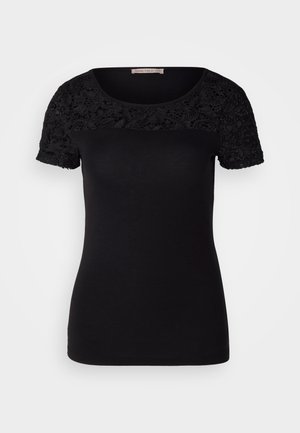 Black short-sleeve t-shirt with a floral lace yoke and smooth fabric. Features a round neckline and fitted design. Lace detail adds texture.