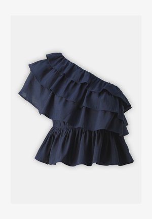 Mørkeblå topp med én skulder som har lagdelte volanger og elastisk midje, laget av lett stoff med en jevn tekstur.