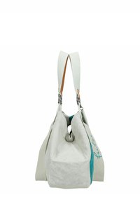 Borsa in canvas con una combinazione di colori grigio e teal, caratterizzata da una texture morbida, un'ampia apertura e doppi manici, uno dei quali con dettagli in pelle.