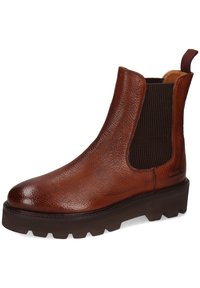Bottines Chelsea en cuir marron avec semelle noire épaisse, panneau latéral élastique à nervures et tirette arrière.