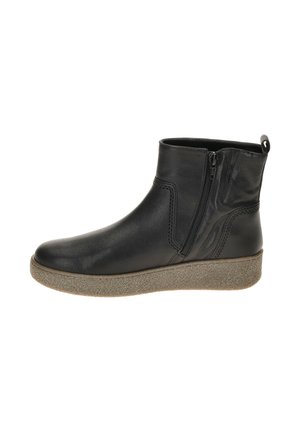 Zwarte leren enkellaarsjes met een afgeronde neus, zijrits en een gestructureerde beige zool. Voorzien van stikdetails langs de schacht.