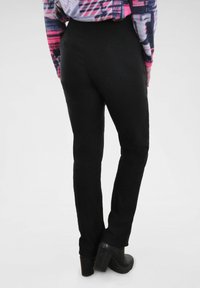 Navigazione WARME BENGALIN LEONIE - Broek - schwarz