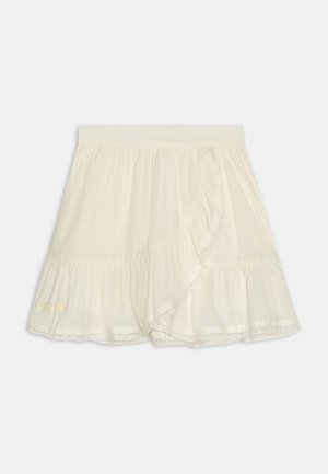 Kremfarget volangskjørt med blonderkant, med omslagsdesign og elastisk midje. Brodert detalj i nederste venstre hjørne.
