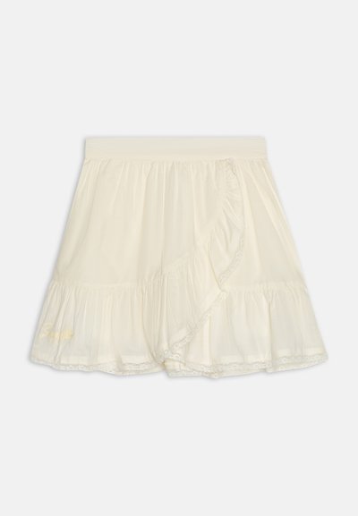 Κρέμα απόχρωσης φούστα με ρυάκια και δαντέλα, διαθέτοντας σχέδιο τύπου περιτυλίγματος και ελαστική μέση. Κεντημένο σχέδιο στην κάτω αριστερή γωνία.