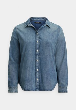 Džinsa krekls ar garām piedurknēm, priekšpusē ar pogām un smailu apkakli, izgatavots no viegli izbalinātas zilas auduma.