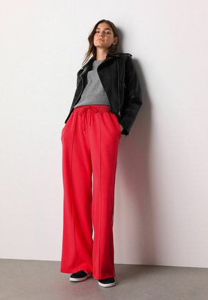 Pantalones deportivos - new red