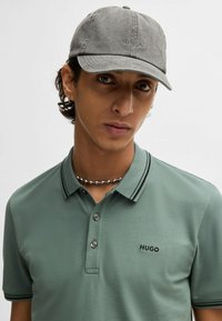 HUGO DINOSO - Poloshirts - open green three