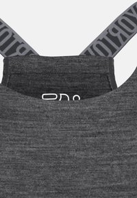 Gray tank top with a textured fabric. The straps are gray with black lettering, featuring a rounded neckline and a logo.