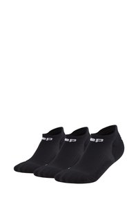 Schwarze, niedrig geschnittene Socken aus einem atmungsaktiven Stoff. Sie bieten eine enge Passform mit einer strukturierten Oberfläche und Logo-Detail am Bündchen.